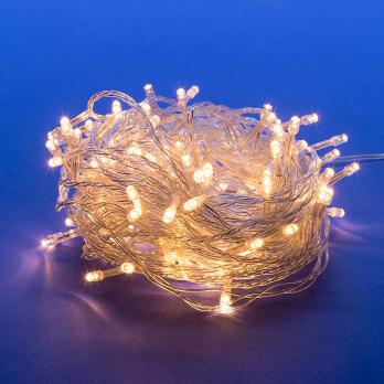 ULD-S1000-100-DTA WARM WHITE IP20 Гирлянда светодиодная. 10м. 100 светодиодов. Теплый белый свет. Провод прозрачный. ТМ Uniel