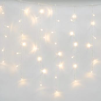 ULD-B6007-200-STK WARM WHITE IP44 Бахрома светодиодная со статическим свечением. 6м. Соединяемая. 200 светодиодов. Теплый белый свет.  Провод прозрачный. ТМ Uniel